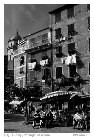 Resting at outdoor terrace on Piazza Guglielmo Marconi, Vernazza. Cinque Terre, Liguria, Italy