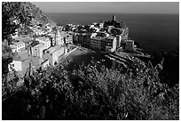 Harbor, church, 11th century castle and village, late afternoon, Vernazza. Cinque Terre, Liguria, Italy ( black and white)