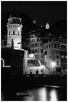 Churches illuminated at night, Vernazza. Cinque Terre, Liguria, Italy (black and white)