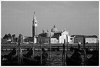 Gondolas, Canale della Guidecca, San Giorgio Maggiore church, late afternoon. Venice, Veneto, Italy ( black and white)