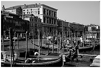 Parked gondolas on the the Grand Canal. Venice, Veneto, Italy (black and white)