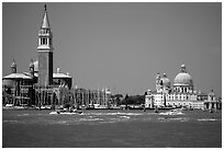 Campanile and Santa Maria della Salute across the Canale della Guidecca, mid-day. Venice, Veneto, Italy (black and white)