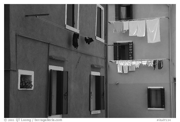 Multicolored houses and hanging laundry, Burano. Venice, Veneto, Italy