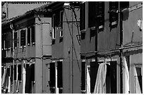 Facades of brightly painted houses, Burano. Venice, Veneto, Italy ( black and white)