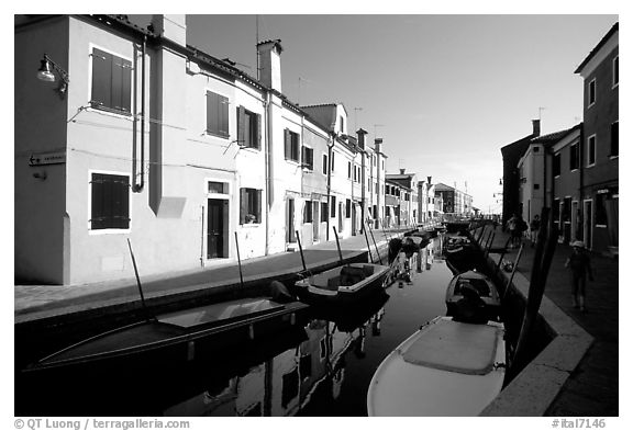 Colorful painted houses along canal, Burano. Venice, Veneto, Italy (black and white)
