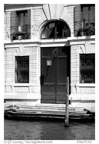 Doorway and steps on the Grand Canal. Venice, Veneto, Italy