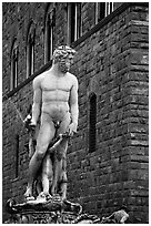 Fontana di Nettuno (Fountain of Neptune) in front of palazzo Vecchio. Florence, Tuscany, Italy (black and white)