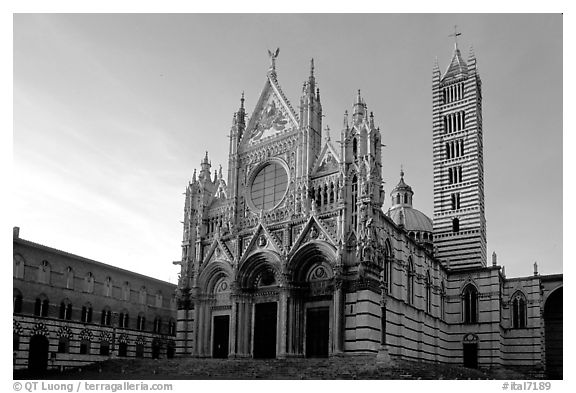 Siena Cathedral (Duomo) with bands of colored marble, late afternoon. Siena, Tuscany, Italy