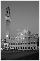 Piazza Del Campo and Palazzo Pubblico at dusk. Siena, Tuscany, Italy (black and white)