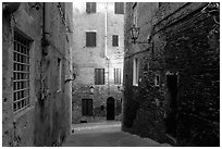 Narrow streets at dawn. Siena, Tuscany, Italy ( black and white)