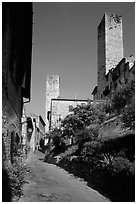 Street dominated by medieval towers. San Gimignano, Tuscany, Italy (black and white)