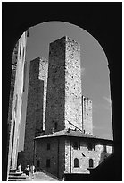Medieval Towers framed by an arch. San Gimignano, Tuscany, Italy (black and white)