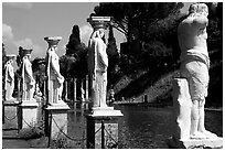Antique statues along the Canopus, Villa Hadriana. Tivoli, Lazio, Italy (black and white)