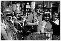 Roman Legionnaires pose with tourists, Roman Forum. Rome, Lazio, Italy ( black and white)
