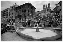 Fontana della Barcaccia at the foot of the Spanish Steps. Rome, Lazio, Italy (black and white)