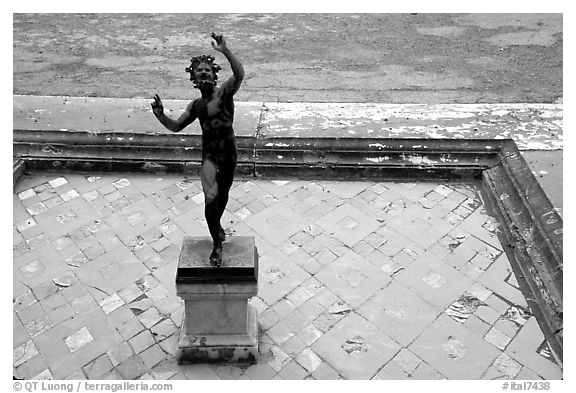 Statue in Casa del Fauno (Villa of the Faune). Pompeii, Campania, Italy (black and white)