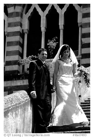 Newly wed couple on the stairs of Duomo Sant'Andrea, Amalfi. Amalfi Coast, Campania, Italy (black and white)