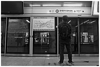 Seoul Subway with platform screen doors. Seoul, South Korea (black and white)