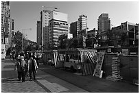 Street lined up with food stalls. Seoul, South Korea (black and white)