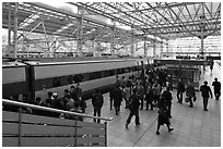 Passengers boarding high speed KTX train. Seoul, South Korea ( black and white)