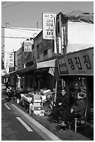 Shopkeepers and storefronts. Daegu, South Korea ( black and white)