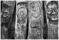 Sculptures on wood stems. Hahoe Folk Village, South Korea ( black and white)