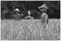 Scarecrows in field. Hahoe Folk Village, South Korea ( black and white)