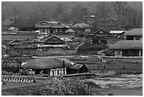 Straw roofed houses and tile roofed houses. Hahoe Folk Village, South Korea ( black and white)