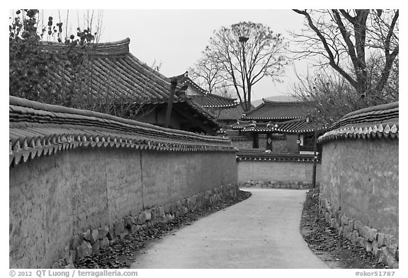 Alley between walls. Hahoe Folk Village, South Korea (black and white)