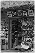 Store selling traditional Hahoe masks. Hahoe Folk Village, South Korea (black and white)