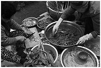 Women making gimchi. Gyeongju, South Korea (black and white)