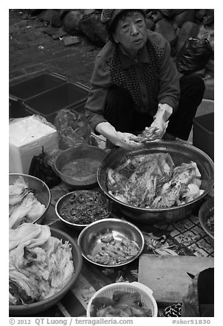 Woman during early winter kim chee preparation. Gyeongju, South Korea (black and white)