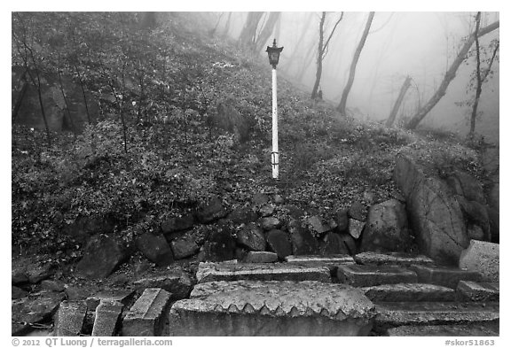 Stones and lantern in fog, Seokguram. Gyeongju, South Korea