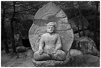 Seated stone Yeora buddha statue, Namsan Mountain. Gyeongju, South Korea ( black and white)