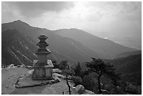 Samnyundaejwabul pagoda and mountain landscape, Namsan Mountain. Gyeongju, South Korea (black and white)
