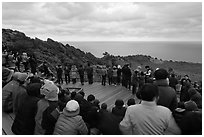 Viewers waiting for sunrise on Ilchulbong. Jeju Island, South Korea (black and white)