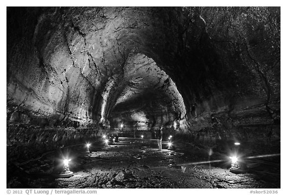 Manjanggul Lava cave with visitor standing. Jeju Island, South Korea (black and white)