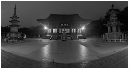 Frontal view of main hall and two pagodas at night, Bulguksa. Gyeongju, South Korea (black and white)