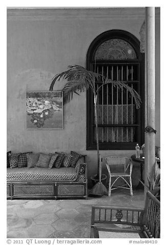 Chairs and blue wall, Cheong Fatt Tze Mansion. George Town, Penang, Malaysia (black and white)