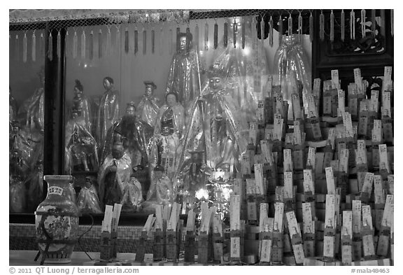 Statues and sticks, Kuan Yin Teng temple. George Town, Penang, Malaysia (black and white)