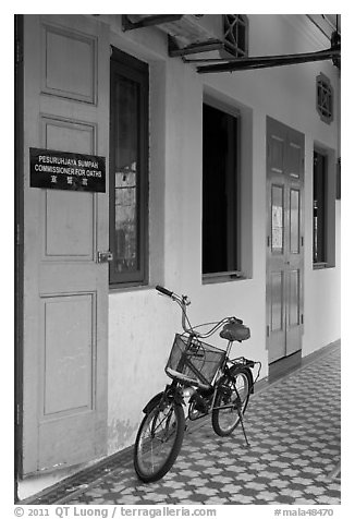 Bicycle in front of office. George Town, Penang, Malaysia (black and white)