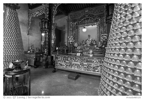 Wishing wheels and altar, Hainan Temple. George Town, Penang, Malaysia (black and white)