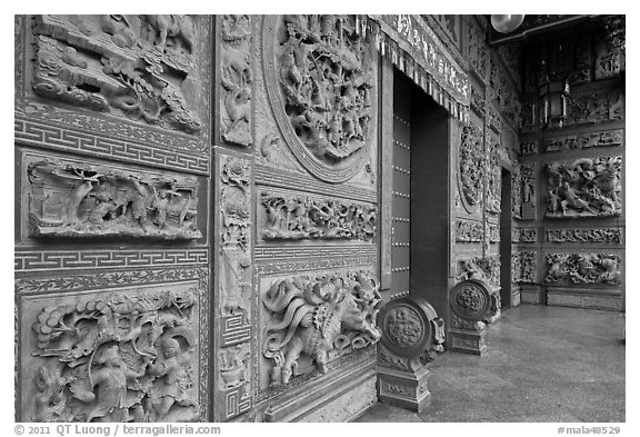 Carved stone walls, Hainan Temple. George Town, Penang, Malaysia