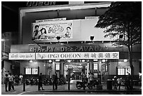 Movie theater showing Bollywood films at night. George Town, Penang, Malaysia (black and white)