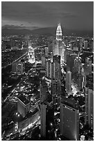 Skyscrappers dominated by Petronas Towers at night. Kuala Lumpur, Malaysia ( black and white)