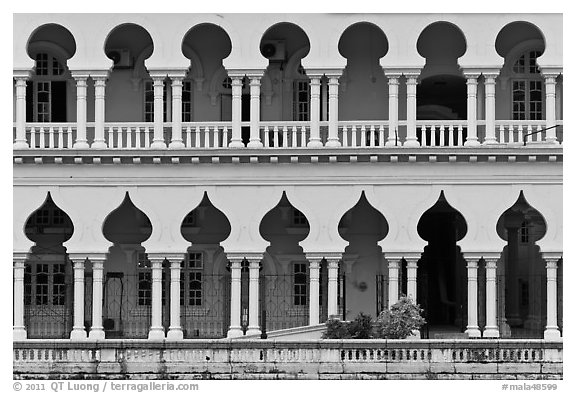 Facade with islamic style arches. Kuala Lumpur, Malaysia (black and white)