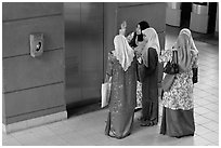 Malaysian women in islamic dress, Suria KLCC. Kuala Lumpur, Malaysia (black and white)