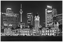 KL night skyline with Sultan Abdul Samad Building and Menara KL. Kuala Lumpur, Malaysia ( black and white)