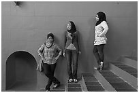 Young women with islamic headscarfs and modern fashions. Malacca City, Malaysia ( black and white)