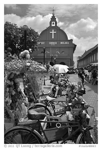 Malacca Town Square with trishaws and church. Malacca City, Malaysia (black and white)